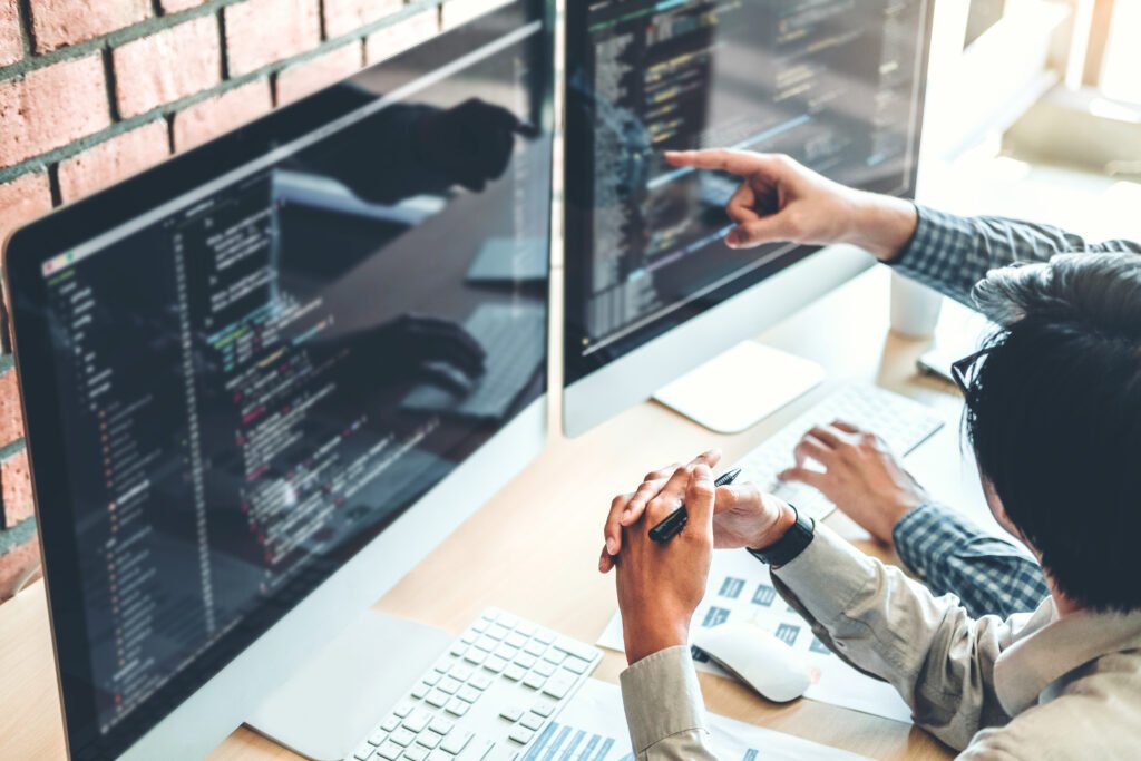 Developers reviewing code monitors